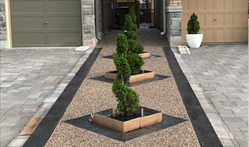 Taj Contractor - Exposed Aggregate Concrete services image.